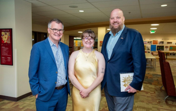 2025 Kirkpatrick winner, Rose McCandless stands between Dean of Libraries Michael Levine-Clark (right) and Taylor Kirkpatrick (left).
